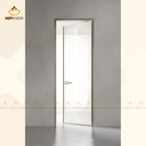 Cửa nhôm slim mở quay 1 cánh màu vàng xước lắp đặt làm cửa phòng đọc sách với kính trong suốt.