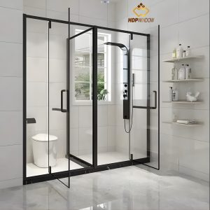 Mẫu phòng tắm kính khung đen phân chia khu vực WC và khu vực tắm đứng.