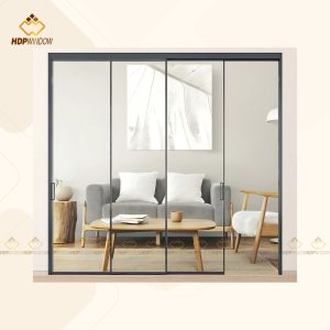 Ứng dụng cửa lùa slim 2 cánh làm vách ngăn kính hiện đại giữa phòng khách và các không gian khác.