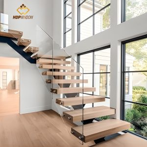 Minh họa mẫu cầu thang kính không trụ, loại bỏ hoàn toàn tay vịn để đạt sự tối giản tuyệt đối.